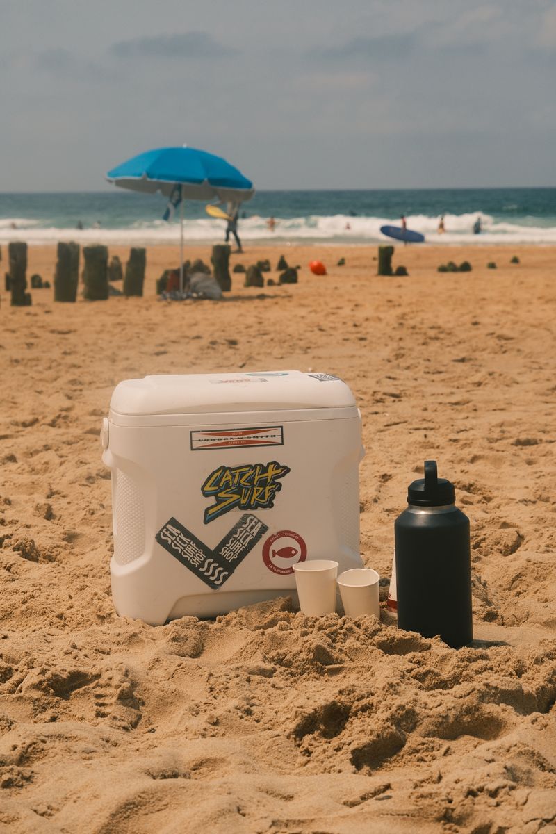 Wheeled cooler on beach